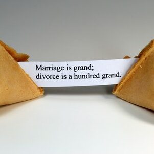 4367422 - fortune cookie with the expression: marriage is grand, divorce is a hundred grand.